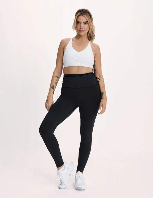 Sarah (Birds Papaya) is 5’8” wearing KNIX L  | Black