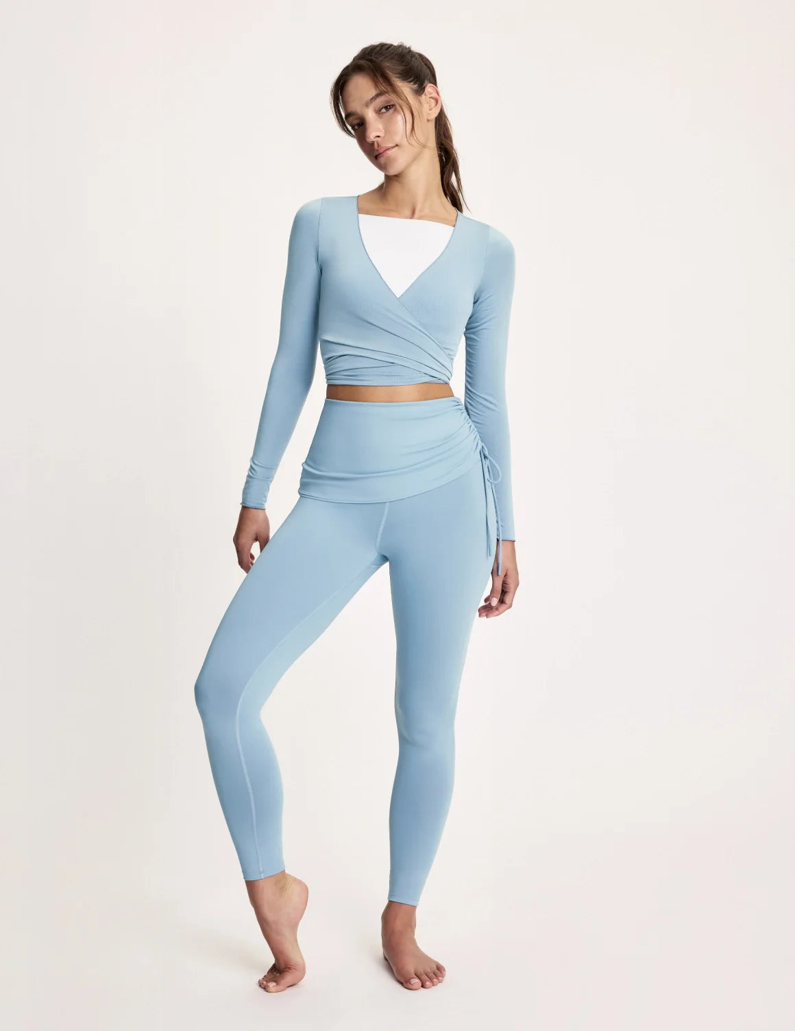 Maya is 5’10”, and wearing KNIX S | Blue Mist