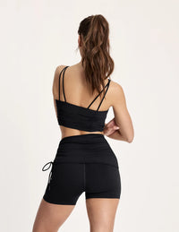 Maya is 5’10”, and wearing KNIX S  | Black