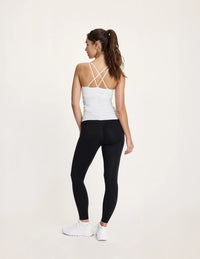 Maya is a 32A and wearing KNIX XS | White