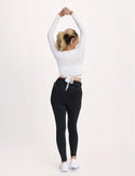 Sarah (Birds Papaya) is wearing KNIX M | White