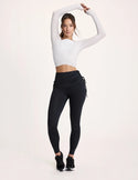Maya is a 32A and wearing KNIX S | White