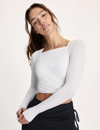 Maya is a 32A and wearing KNIX S | White