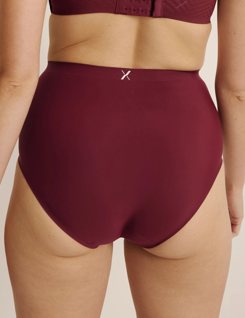 Back view of model wearing the Super Leakproof® No-Show High Rise highlighting the coverage and smooth fit