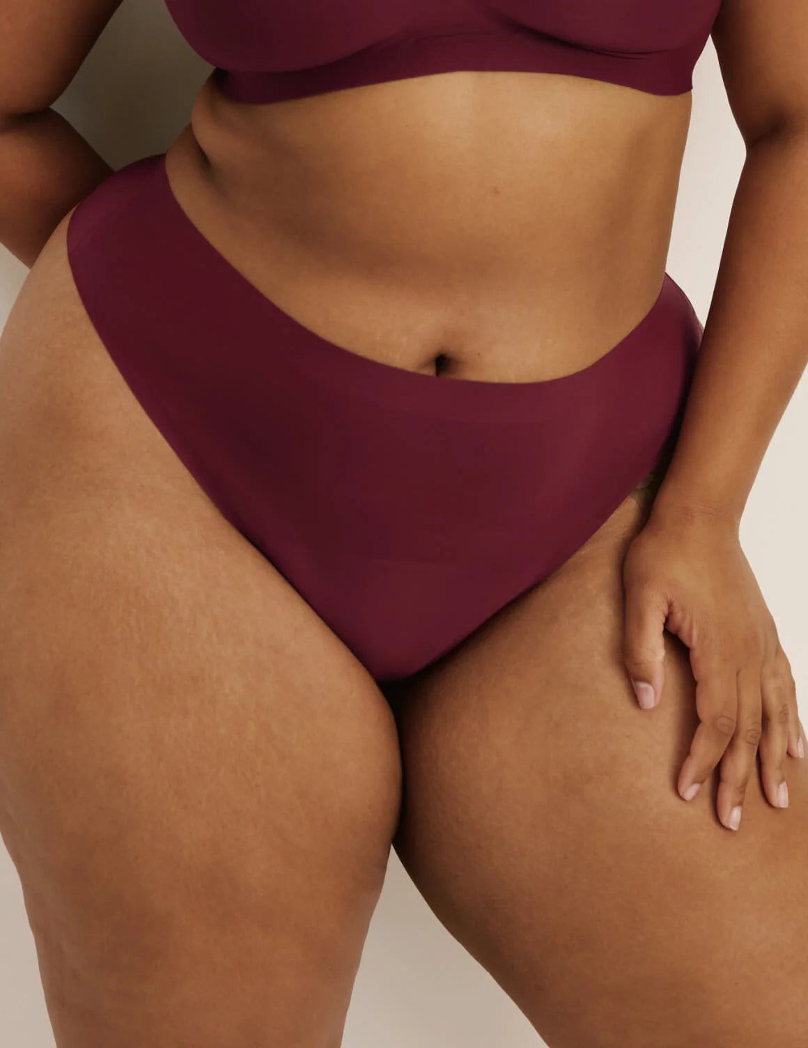 Leslie has 49” hips and wears KNIX XXL | Dark Cherry