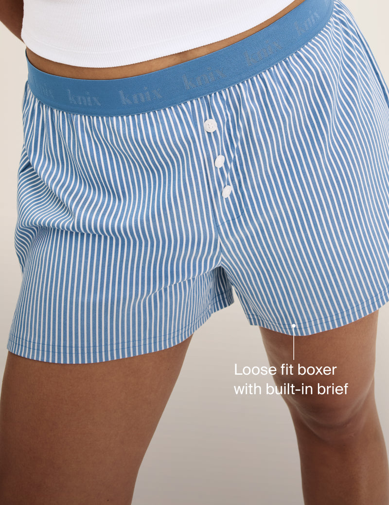 Text on Image: Loose fit boxer with built-in brief