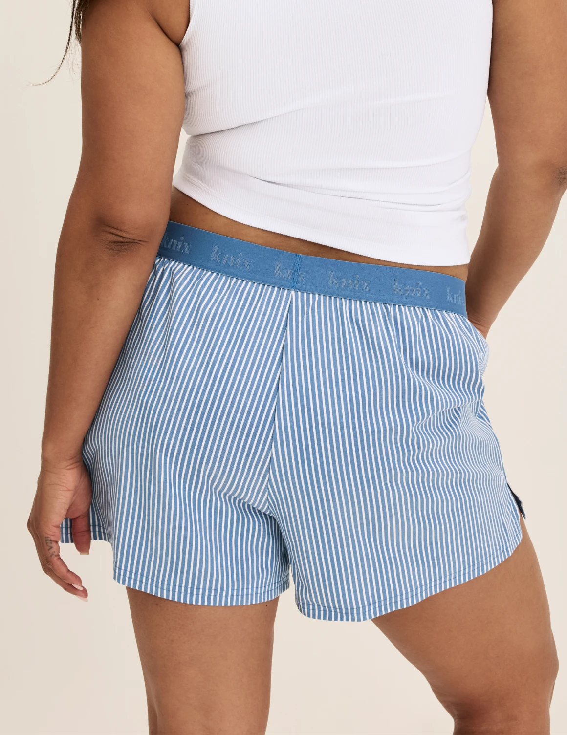 Binta wears KNIX L | Blue Stripe