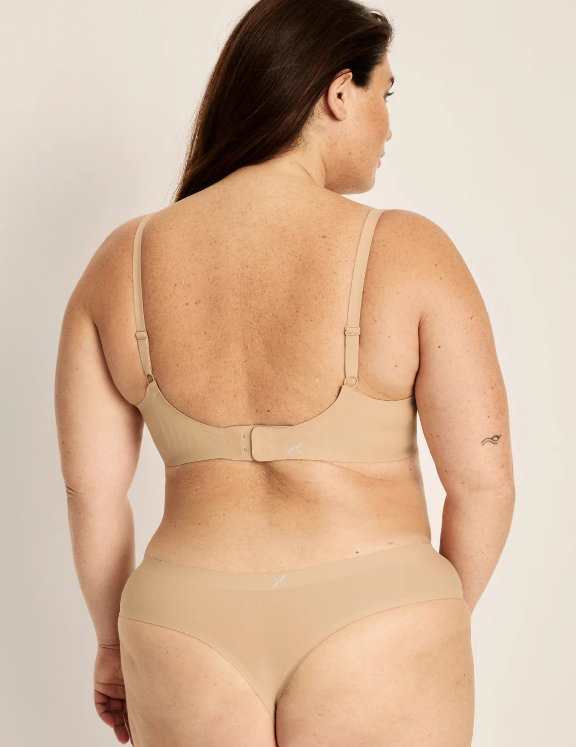 Clementine has 51” hips, and wearing KNIX XXL | Warm Sand