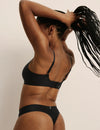 Gin has 38” hips, and wearing KNIX S | Black