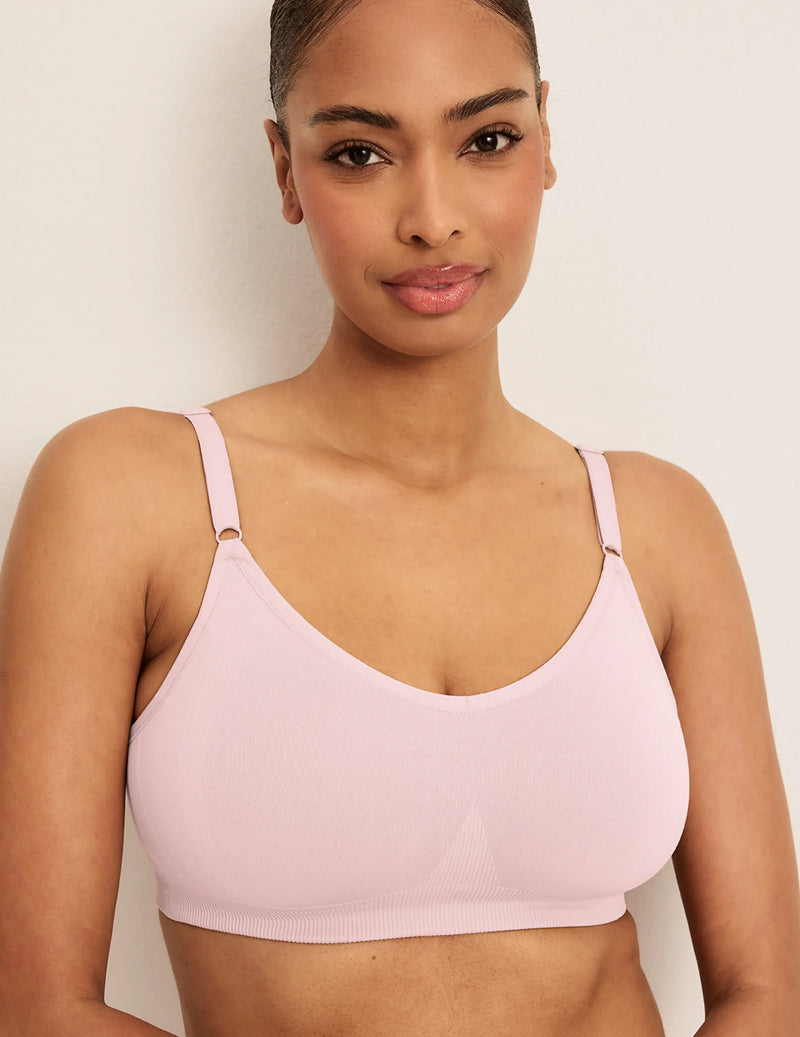 Front view of model wearing the Good to Go Seamless Bra, highlighting the neckline, strap design, and  silhouette