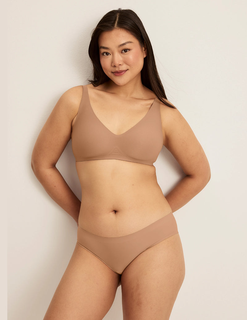 Front view of model wearing the Light Leakproof No-Show Bikini highlighting the coverage and smooth fit