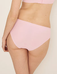 Back view of model wearing the Light Leakproof No-Show Bikini highlighting the coverage and smooth fit