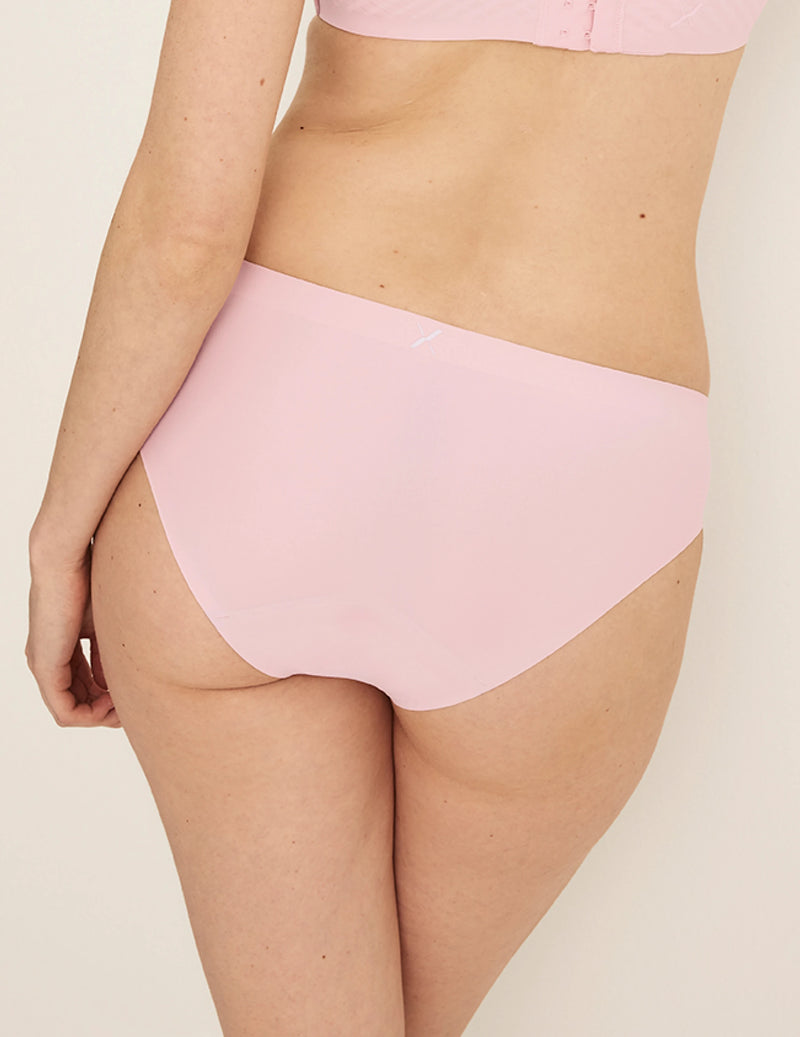 Back view of model wearing the Light Leakproof No-Show Bikini highlighting the coverage and smooth fit