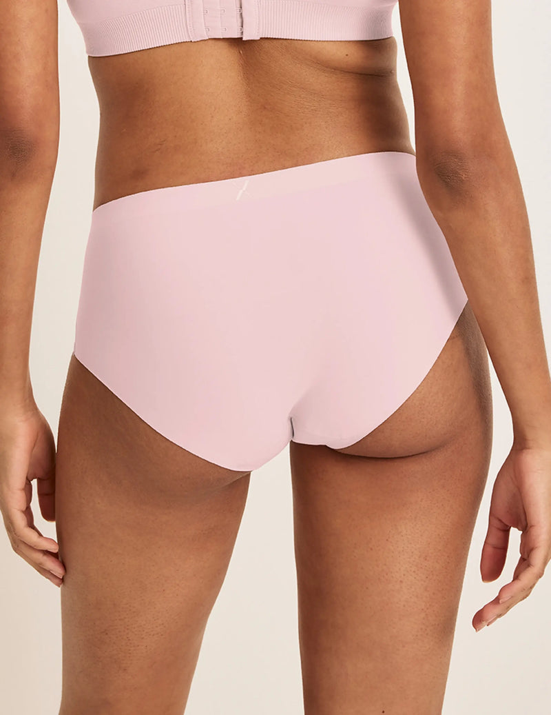 Back view of model wearing the Light Leakproof No-Show Boyshort highlighting the coverage and smooth fit