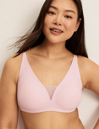 Front view of model wearing the Revolution Shadow Mesh Bra, highlighting the neckline, strap design, and  silhouette