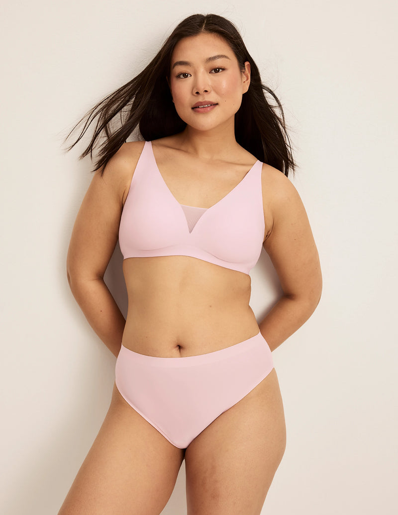 Front view of model wearing the Revolution Shadow Mesh Bra, highlighting the neckline, strap design, and  silhouette
