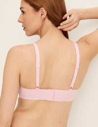 Back view of model wearing the WingWoman Contour Bra, highlighting the neckline, strap design, and  silhouette