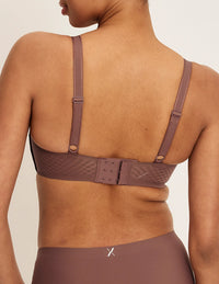 Back view of model wearing the WingWoman Contour Bra, highlighting the neckline, strap design, and  silhouette