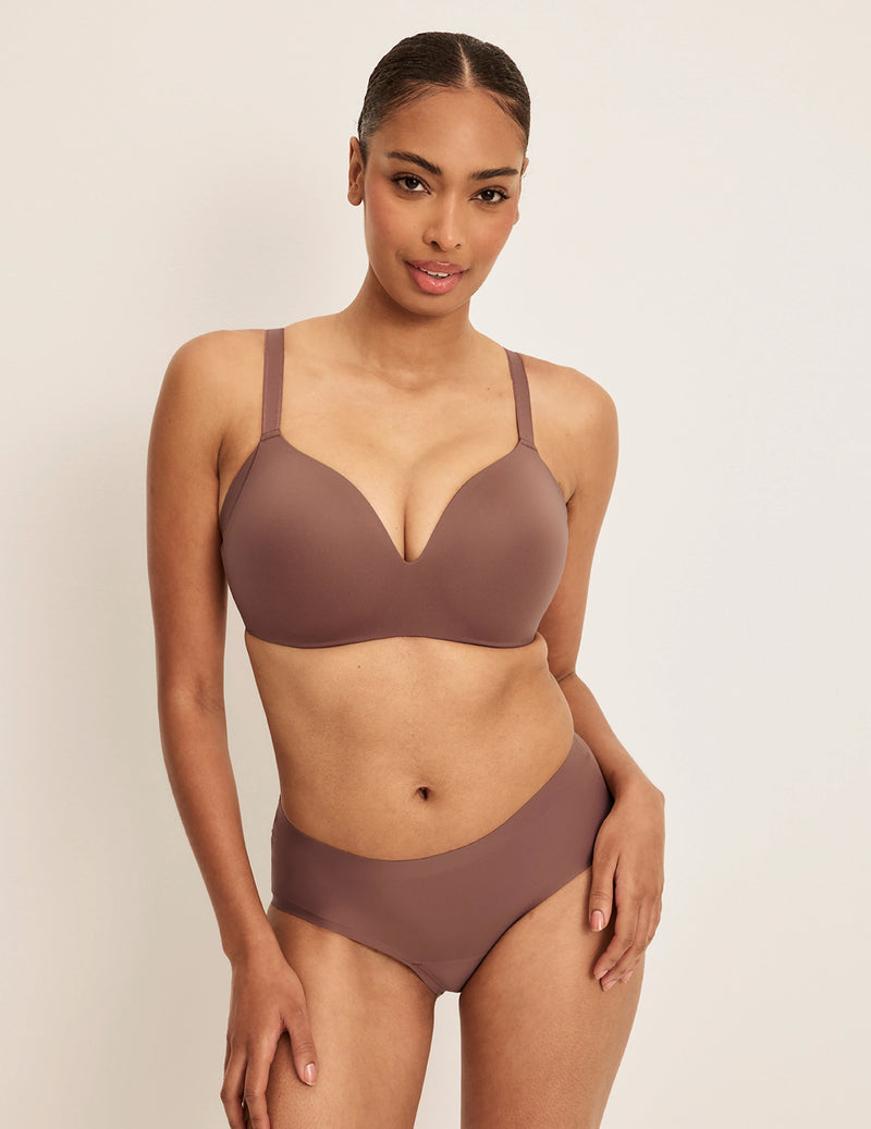 Front view of model wearing the WingWoman Contour Bra, highlighting the neckline, strap design, and  silhouette