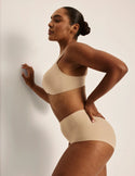 Amber is wearing a 36C  | Warm Sand